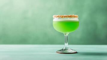 Tropical pandan and coconut rum cocktail with a vibrant green hue, served with a toasted coconut rim, against a gradient background fading from emerald green to soft cream photo