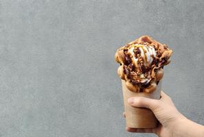 Hong Kong waffles or bubble wafer in hand photo