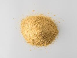 Nutritional inactive yeast heap top view photo