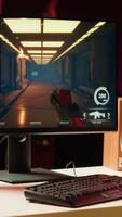 Vertical Man arriving at home to play videogames on gaming PC at computer desk, enjoying day off from work. Gamer entering room, battling enemies in online multiplayer shooter, camera A video
