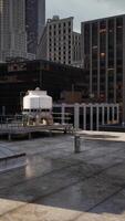 empty rooftop in a bustling city at, with twinkling lights and a panoramic view video