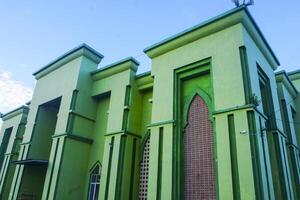 the view of the mosque and its dome looks out, creating a stunning view photo