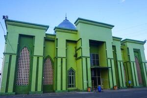 the view of the mosque and its dome looks out, creating a stunning view photo
