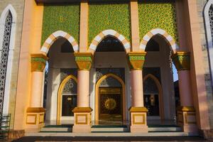 Artistic photo of a mosque wall which has the impression of Islamic religious symbols