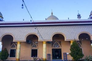 the view of the mosque and its dome looks out, creating a stunning view photo