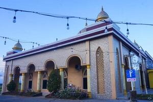 the view of the mosque and its dome looks out, creating a stunning view photo