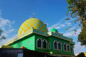 the view of the mosque and its dome looks out, creating a stunning view photo