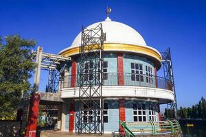 the view of the mosque and its dome looks out, creating a stunning view photo