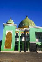 the view of the mosque and its dome looks out, creating a stunning view photo
