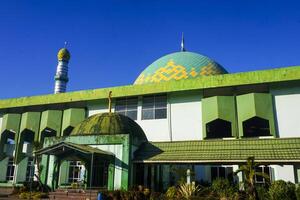 the view of the mosque and its dome looks out, creating a stunning view photo