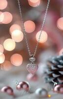 Sparkling Heart Pendant Necklace With Bokeh Background in Soft Pink Tones photo