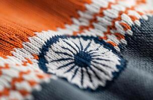 Vibrant Fabric With Orange and Gray Stripes on a Soft Surface photo