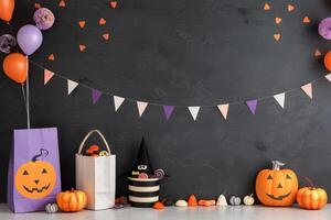 Colorful Halloween Decorations With Pumpkins and Candy on Black Background photo