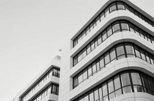 Modern Architectural Building With Sleek Lines and Large Windows in Urban Setting photo