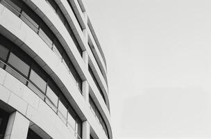 Modern Architectural Building With Sleek Lines and Large Windows in Urban Setting photo