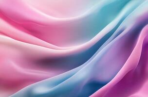 Soft pink and blue silk fabric draped in gentle waves in natural light photo