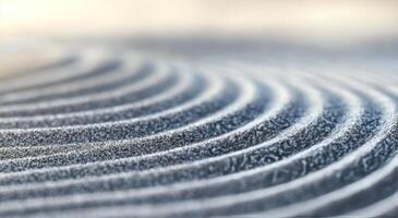 Rippling sand patterns created by gentle wind in a coastal area photo