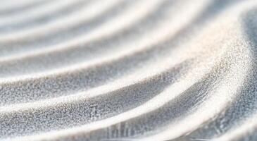Rippling sand patterns created by gentle wind in a coastal area photo