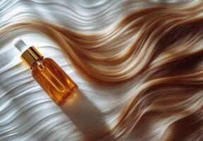 Hair serum and silky strands displayed on a soft surface photo