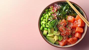 Fresh salmon and greens in a vibrant bowl with sesame dressing photo