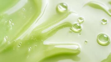 This captivating image features a macro view of a vibrant green serum, highlighting its smooth, luxurious texture with delicate bubble drops, ideal for skincare and wellness enthusiasts photo