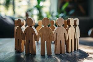 A circle of carved wooden figures symbolizes teamwork, unity, and community values, showcasing the importance of collaboration and togetherness to achieve common goals and embody cooperation photo