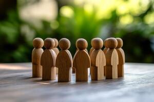 A beautifully crafted circle of wooden figures symbolizes teamwork, unity, and community strength, inspiring collaboration and fostering deep connections across various settings and groups photo