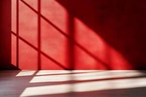 A vibrant red wall that casts intricate shadows, effectively highlighting the dynamics and patterns of light photo