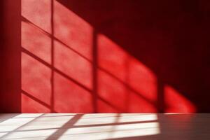 Artistic shadows beautifully cast on a vibrant, bold red wall, capturing the interplay of light and color photo