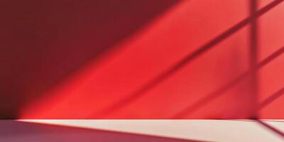 A vibrant, striking red wall casting intricate shadows, showcasing the fascinating interplay of light and color photo