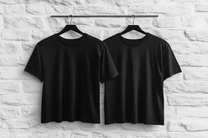 This mockup elegantly showcases a stylish black blank tshirt, presenting both the front and back views against a bright white wall, making it an ideal choice for professional design presentations photo