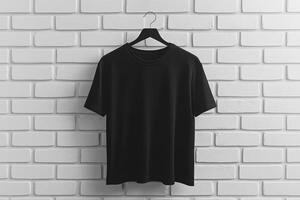A stylish black tshirt elegantly displayed on a hanger, making it perfect for casual wear in a modern backdrop photo