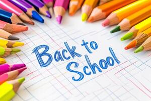 A vibrant collection of pencils frames a cheerful Back to School message on a blank white sheet, capturing the excitement for the upcoming school year and students educational adventures photo
