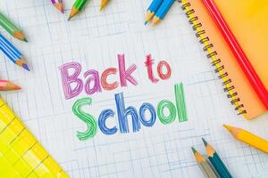 A vibrant array of pencils is displayed beside a lively Back to School message, signaling the start of an exciting new school year filled with opportunities for learning and growth photo