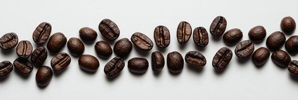 A visually appealing and wellorganized arrangement of coffee beans elegantly surrounding a blank space, which is ideal for use in coffeerelated designs, marketing materials, or promotional purposes photo