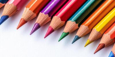 A vibrant and colorful array of colored pencils is fully prepared for artistic expression and creativity photo