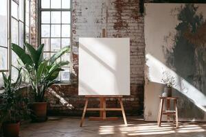 This bright loft has large windows that flood it with light and white walls, providing a blank canvas for creativity. With arranged plants, it offers a warm atmosphere for showcasing design and art photo