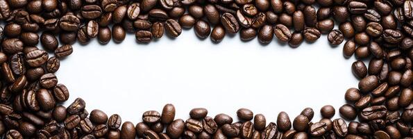 An aesthetically pleasing arrangement of freshly roasted coffee beans creates a beautiful border around a blank central space, ideal for branding, engaging promotions, or any coffeerelated content photo