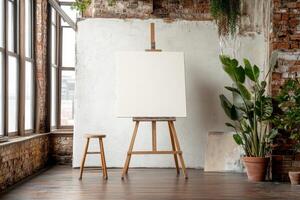 This bright and spacious loft features large windows and white walls, providing a perfect canvas for showcasing unique artistic designs and inspiring talented creators and craftsmen photo