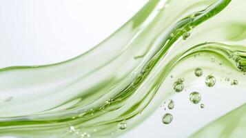 A macro view of a vibrant green serum highlights its unique texture and bubbles, showcasing a commitment to health, wellness, and innovative natural skincare solutions for diverse needs photo