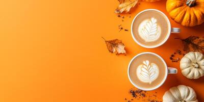 Enjoy a cozy pumpkin latte this season, a warm drink that complements autumn leaves and pumpkins, perfect for celebrating fall with loved ones and capturing the essence of October photo