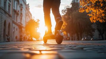 An individual rides a stylish electric scooter down a bustling city street at sunset, showcasing urban mobility and the importance of ecofriendly transportation solutions in modern life photo