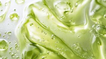 This detailed macro view of a vibrant green serum highlights its unique texture and delightful bubbles, emphasizing qualities such as purity and a focus on natural wellness in the skincare industry photo