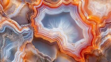 Polished agate with vibrant orange and blue layered patterns. photo