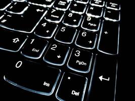 Closup View of Computer Keyboard with backlit keys photo