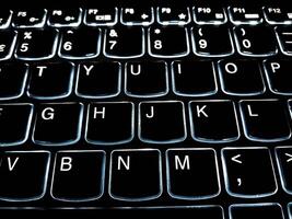 Closup View of Computer Keyboard with backlit keys photo