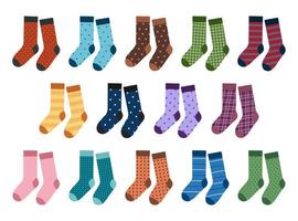 Set of colored pairs of socks with different patterns. Foot apparel collection. Cotton and wool accessory. Flat illustration isolated on white background vector