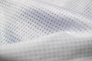 close up texture of jersey fabric with drop needle motif photo