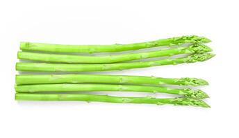 Asparagus on white background. Top view photo
