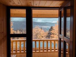 View from the window of a modular prefabricated house in the mountains. Mountain landscape photo